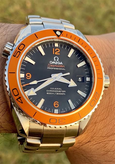 omega seamaster planet ocean price|omega planet ocean orange bezel.